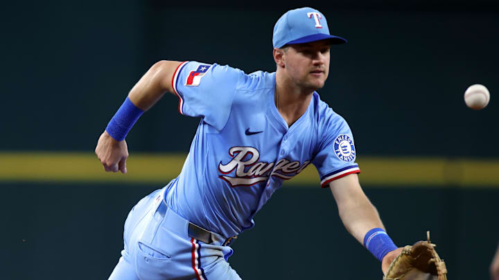 Texas Rangers third base Josh Jung (6) commits a fielding error during the fourth inning against the Seattle Mariners at Globe Life Field on June 29. 