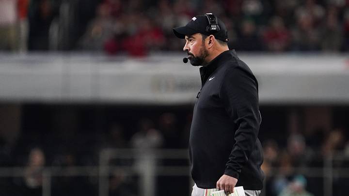 Dec 31, 2025; Arlington, TX, USA; Ohio State Buckeyes head coach Ryan Day looks on during the first quarter against the Miami Hurricanes during the 2025 Cotton Bowl and quarterfinal game of the College Football Playoff at AT&T Stadium. Mandatory Credit: Raymond Carlin III-Imagn Images Dec 31, 2025; Arlington, TX, USA; Ohio State Buckeyes head coach Ryan Day looks on during the first quarter against the Miami Hurricanes during the 2025 Cotton Bowl and quarterfinal game of the College Football Playoff at AT&T Stadium. Mandatory Credit: Raymond Carlin III-Imagn Images