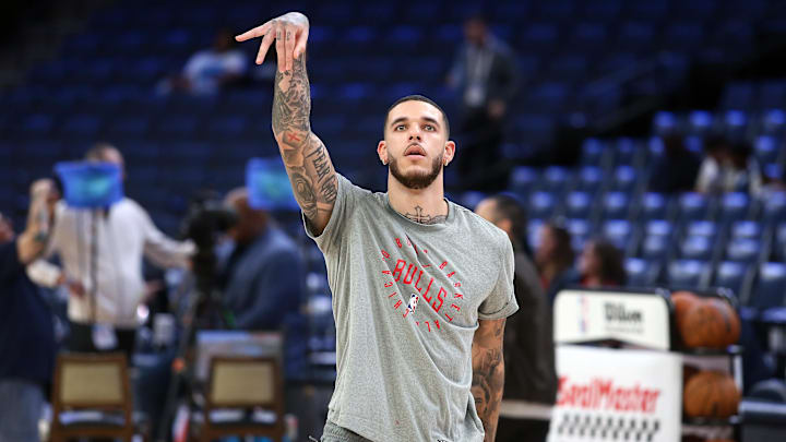 Oct 28, 2024; Memphis, Tennessee, USA; Chicago Bulls guard Lonzo Ball (2) holds after a shot during warm ups prior to the game against the Memphis Grizzlies at FedExForum. Mandatory Credit: Petre Thomas-Imagn Images