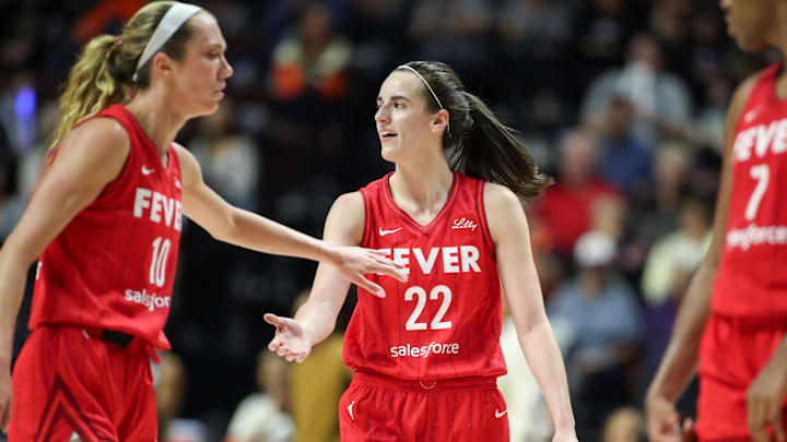 Sep 25, 2024; Uncasville, Connecticut, USA; Indiana Fever guard Caitlin Clark (22) reacts during the second half against the Connecticut Sun during game two of the first round of the 2024 WNBA Playoffs at Mohegan Sun Arena. Mandatory Credit: Paul Rutherford-Imagn Images