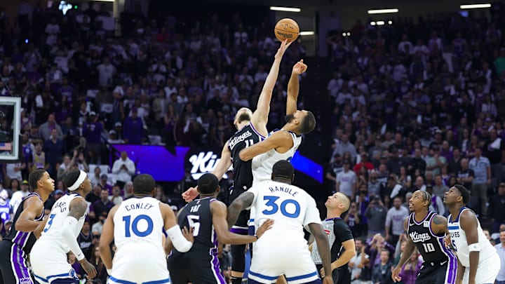 Oct 24, 2024; Sacramento, California, USA; Sacramento Kings forward Domantas Sabonis (11) and Minnesota Timberwolves center Rudy Gobert (27) jump for the ball during the first quarter at Golden 1 Center. Mandatory Credit: Sergio Estrada-Imagn Images