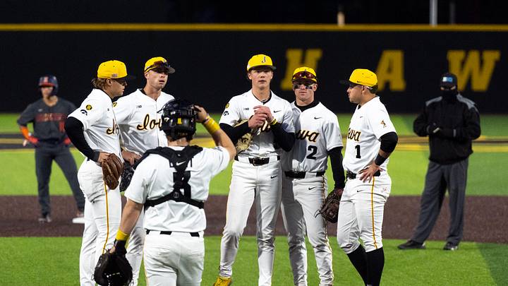 The Iowa Hawkeyes huddle on the mound May 1, 2026 during a Big Ten baseball game against the Illinois Fighting Illini at Duane Banks Field in Iowa City, Iowa. The Iowa Hawkeyes huddle on the mound May 1, 2026 during a Big Ten baseball game against the Illinois Fighting Illini at Duane Banks Field in Iowa City, Iowa.
