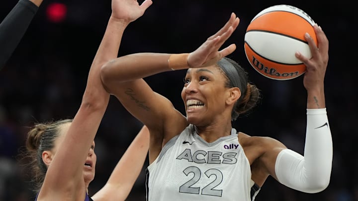 Aug 15, 2025; Phoenix, Arizona, USA; Las Vegas Aces center A'ja Wilson (22) shoots over Phoenix Mercury guard Sami Whitcomb (33) in the first half at Footprint Center. Mandatory Credit: Rick Scuteri-Imagn Images Aug 15, 2025; Phoenix, Arizona, USA; Las Vegas Aces center A'ja Wilson (22) shoots over Phoenix Mercury guard Sami Whitcomb (33) in the first half at Footprint Center. Mandatory Credit: Rick Scuteri-Imagn Images