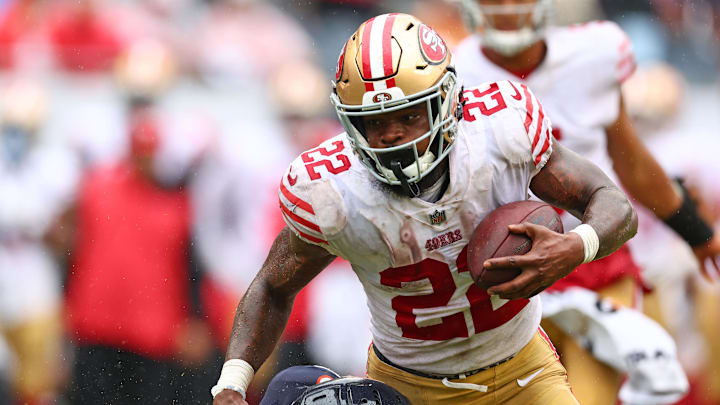 Sep 11, 2022; Chicago, Illinois, USA; San Francisco 49ers running back Jeff Wilson Jr. (22) rushes the ball against the Chicago Bears during the second half at Soldier Field.