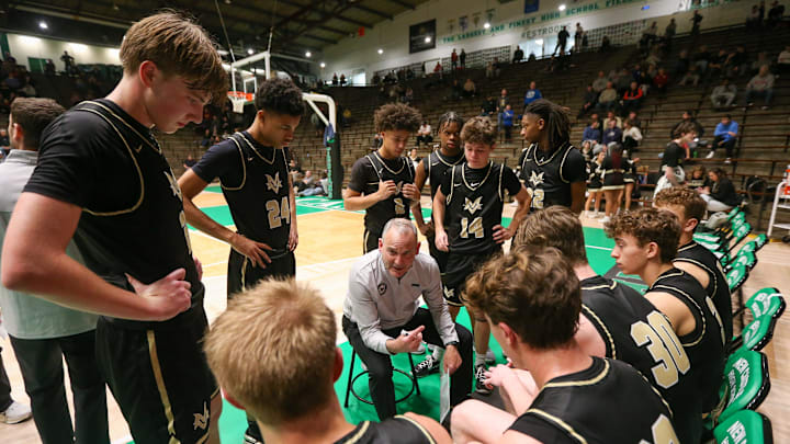 Mt. Vernon Marauders Coach Joe Bradburn set up plays during a time out as the Crown Point Bulldogs battled the Mt. Vernon Marauders in the Henry Community Health Boys’ Hall of Fame Classic Championship Game, Dec 23, 2025; New Castle, IN, at New Castle Fieldhouse.