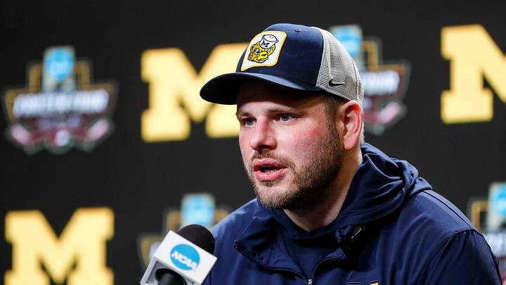 Michigan head coach Brandon Naurato answers a question at a press conference for the semifinal game against Boston College at Xcel Energy Center in St. Paul, Minn. on Wednesday, April 10, 2024.