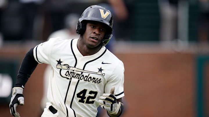Vanderbilt center fielder RJ Austin (42) runs the bases after hitting a home run against Florida