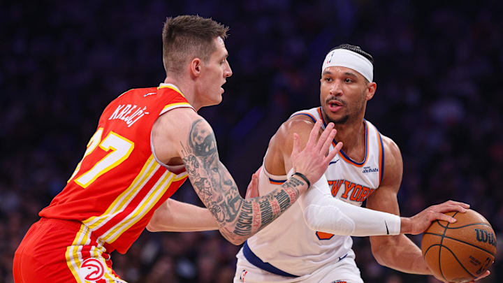 Jan 20, 2025; New York, New York, USA; New York Knicks guard Josh Hart (3) shields the ball from Atlanta Hawks guard Vit Krejci (27) during the first half at Madison Square Garden. Mandatory Credit: Vincent Carchietta-Imagn Images