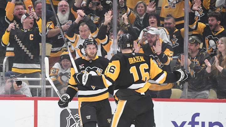 Oct 25, 2025; Pittsburgh, Pennsylvania, USA; Pittsburgh Penguins right wing Anthony Mantha (39) celebrates his goal with right wing Justin Brazeau (16) against the Columbus Blue Jackets during the first period at PPG Paints Arena. Mandatory Credit: Philip G. Pavely-Imagn Images