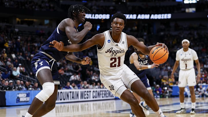March 20, 2025; Denver, CO, USA; Texas A&M Aggies forward Pharrel Payne (21) drives against Yale Bulldogs center Samson Aletan (10) during the first half at Ball Arena. Mandatory Credit: Isaiah J. Downing-Imagn Images March 20, 2025; Denver, CO, USA; Texas A&M Aggies forward Pharrel Payne (21) drives against Yale Bulldogs center Samson Aletan (10) during the first half at Ball Arena. Mandatory Credit: Isaiah J. Downing-Imagn Images