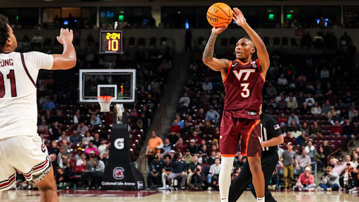 Dec 2, 2025; Columbia, S.C.; Virginia Tech guard Ben Hammond (3) attempts a three-point basket against South Carolina.