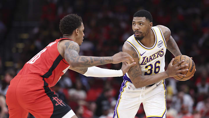 Jabari Smith Jr. and Marcus Smart 