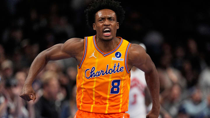 Nov 29, 2025; Charlotte, North Carolina, USA; Charlotte Hornets guard Collin Sexton (8) reacts after defeating the Toronto Raptors in overtime at Spectrum Center. Mandatory Credit: Jim Dedmon-Imagn Images