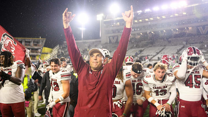 Nov 9, 2024; Nashville, Tennessee, USA;  South Carolina Gamecocks head coach Shane Beamer and his team celebrate the after defeating the Vanderbilt Commodores at FirstBank Stadium. Mandatory Credit: Steve Roberts-Imagn Images