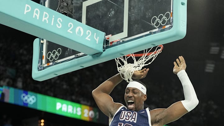 Aug 10, 2024; Paris, France; United States centre Bam Adebayo (13) reacts in the first half against France in the men's basketball gold medal game during the Paris 2024 Olympic Summer Games at Accor Arena. Mandatory Credit: Kyle Terada-Imagn Images