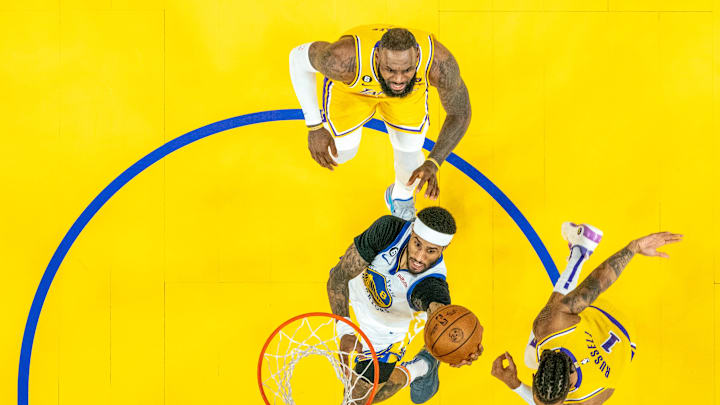 May 10, 2023; San Francisco, California, USA; Golden State Warriors guard Gary Payton II (8) shoots the basketball against Los Angeles Lakers forward LeBron James the 2023 NBA playoffs.