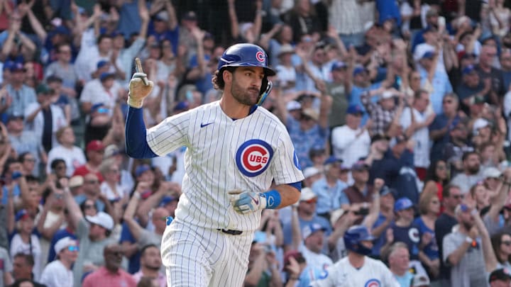 Apr 23, 2026; Chicago, Illinois, USA; Chicago Cubs shortstop Dansby Swanson (7) hits a walk-off single against the Philadelphia Phillies during the tenth inning at Wrigley Field. Mandatory Credit: David Banks-Imagn Images