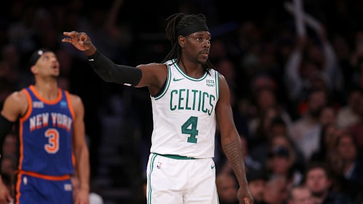 Boston Celtics guard Jrue Holiday celebrates his three point shot against New York Knicks guard Josh Hart. Mandatory Credit: Brad Penner-Imagn Images