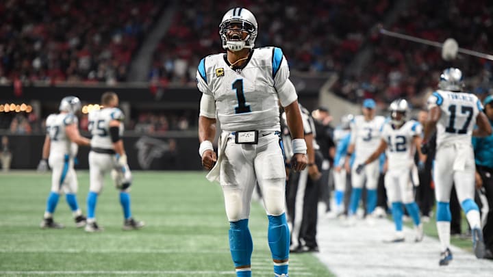 Dec 31, 2017; Atlanta, GA, USA; Carolina Panthers quarterback Cam Newton (1) reacts after throwing a touchdown pass against the Atlanta Falcons during the second quarter at Mercedes-Benz Stadium. Mandatory Credit: Dale Zanine-Imagn Images