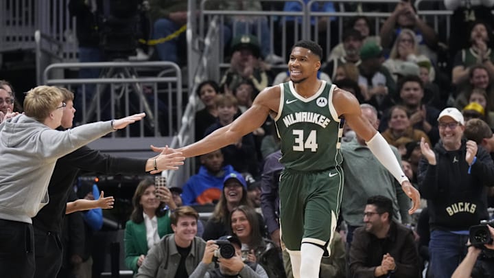 Nov 2, 2024; Milwaukee, Wisconsin, USA; Milwaukee Bucks forward Giannis Antetokounmpo (34) celebrates with the fans after making a basket against the Cleveland Cavaliers in the first half at Fiserv Forum. Mandatory Credit: Michael McLoone-Imagn Images Nov 2, 2024; Milwaukee, Wisconsin, USA; Milwaukee Bucks forward Giannis Antetokounmpo (34) celebrates with the fans after making a basket against the Cleveland Cavaliers in the first half at Fiserv Forum. Mandatory Credit: Michael McLoone-Imagn Images