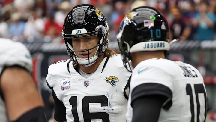 Sep 29, 2024; Houston, Texas, USA; Jacksonville Jaguars quarterback Mac Jones (10) celebrates quarterback Trevor Lawrence (16) touchdown pass against the Houston Texans in the first quarter at NRG Stadium. Mandatory Credit: Thomas Shea-Imagn Images Sep 29, 2024; Houston, Texas, USA; Jacksonville Jaguars quarterback Mac Jones (10) celebrates quarterback Trevor Lawrence (16) touchdown pass against the Houston Texans in the first quarter at NRG Stadium. Mandatory Credit: Thomas Shea-Imagn Images