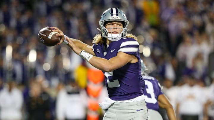 Nov 16, 2024; Manhattan, Kansas, USA; Kansas State Wildcats quarterback Avery Johnson (2) drops back to pass against the Arizona State Sun Devils during the first quarter at Bill Snyder Family Football Stadium. Mandatory Credit: Scott Sewell-Imagn Images