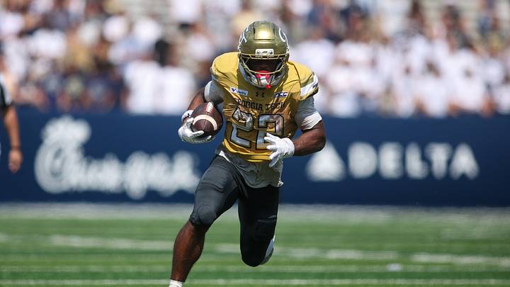 Sep 19, 2026; Atlanta, Georgia, USA; Georgia Tech Yellow Jackets running back Justice Haynes (22) runs the ball for a touchdown against the Mercer Bears in the third quarter at Bobby Dodd Stadium at Hyundai Field. Mandatory Credit: Brett Davis-Imagn Images Sep 19, 2026; Atlanta, Georgia, USA; Georgia Tech Yellow Jackets running back Justice Haynes (22) runs the ball for a touchdown against the Mercer Bears in the third quarter at Bobby Dodd Stadium at Hyundai Field. Mandatory Credit: Brett Davis-Imagn Images