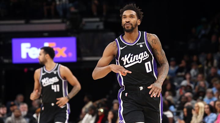 Sacramento Kings guard Malik Monk (0) reacts after a three.