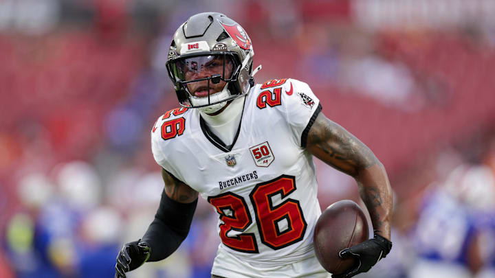 Aug 23, 2025; Tampa, Florida, USA; Tampa Bay Buccaneers safety Kaevon Merriweather (26) warms up before a game against the Buffalo Bills at Raymond James Stadium. Mandatory Credit: Nathan Ray Seebeck-Imagn Images
