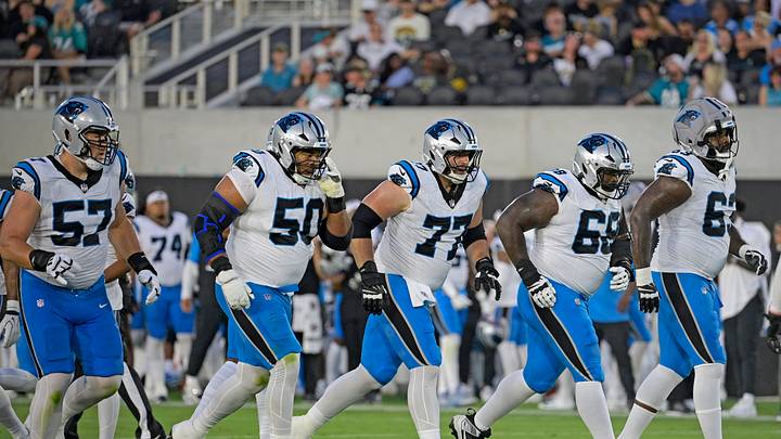 Aug 21, 2026; Jacksonville, Florida, USA;  Carolina Panthers offensive lineman, tackle Monroe Freeling (57), guard Robert Hunt (50), center Luke Fortner (77), guard Damien Lewis (68), and tackle Rasheed Walker (63) line up for a snap in the first quarter during the preseason game against the Jacksonville Jaguars at EverBank Stadium.  Mandatory Credit: Melina Myers-Imagn Images