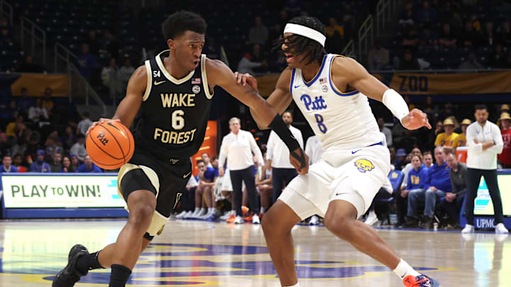 Jan 27, 2026; Pittsburgh, Pennsylvania, USA;  Wake Forest Demon Deacons guard Myles Colvin (6) drives to the basket against Pittsburgh Panthers guard Omari Witherspoon (8) during the second half at the Petersen Events Center. Mandatory Credit: Charles LeClaire-Imagn Images