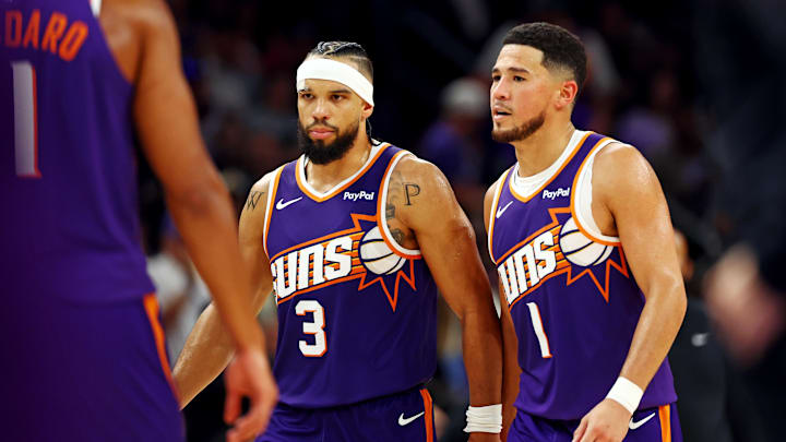 Oct 22, 2025; Phoenix, Arizona, USA; Phoenix Suns guard Devin Booker (1) and forward Dillon Brooks (3) during the second half against the Sacramento Kings at the Mortgage Matchup Center. Mandatory Credit: Mark J. Rebilas-Imagn Images Oct 22, 2025; Phoenix, Arizona, USA; Phoenix Suns guard Devin Booker (1) and forward Dillon Brooks (3) during the second half against the Sacramento Kings at the Mortgage Matchup Center. Mandatory Credit: Mark J. Rebilas-Imagn Images