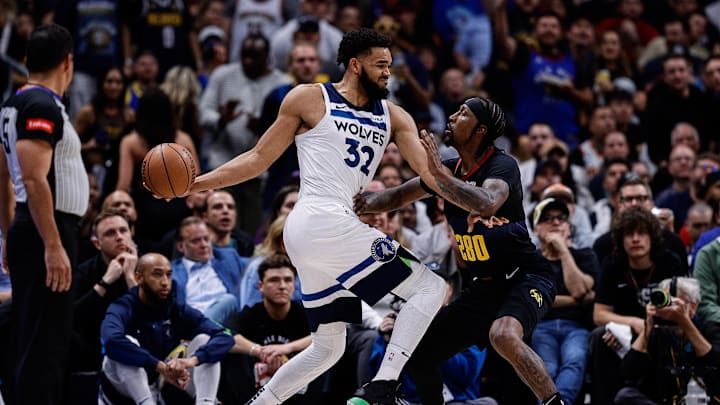 May 14, 2024; Denver, Colorado, USA; Minnesota Timberwolves center Karl-Anthony Towns (32) controls