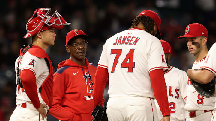 Angels manager Ron Washington (37) removes Los Angeles Angels pitcher Kenley Jansen (74) from the game during the ninth inning against the Detroit Tigers at Angel Stadium. 