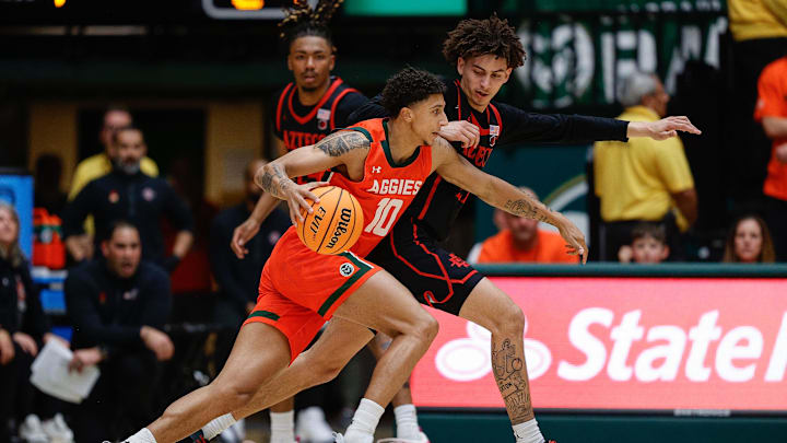 Feb 8, 2025; Fort Collins, Colorado, USA; Colorado State Rams guard Nique Clifford (10) controls the ball under pressure from San Diego State Aztecs guard Miles Byrd (21) in the first half at Moby Arena. Mandatory Credit: Isaiah J. Downing-Imagn Images