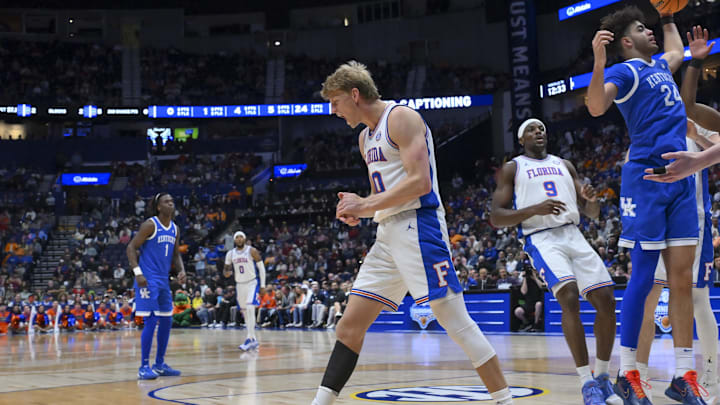 Mar 13, 2026; Nashville, TN, USA;  Florida Gators forward Thomas Haugh (10) reacts after getting fouled by Kentucky Wildcats forward Andrija Jelavic (4) during the first half at Bridgestone Arena. Mandatory Credit: Steve Roberts-Imagn Images