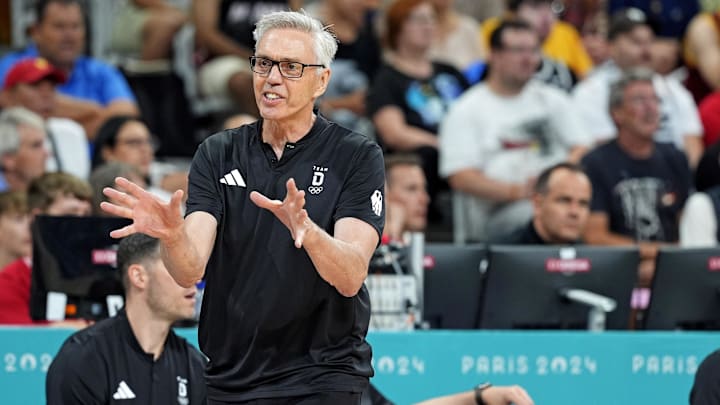 Jul 30, 2024; Villeneuve-d'Ascq, France; Germany head coach Gordie Fin Herbert talks to his team during the game against Brazil in men’s basketball group B play during the Paris 2024 Olympic Summer Games at Stade Pierre-Mauroy. Mandatory Credit: John David Mercer-Imagn Images