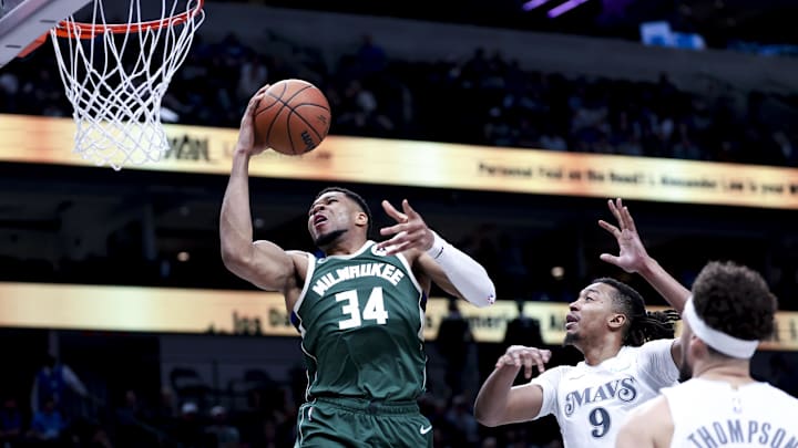Mar 1, 2025; Dallas, Texas, USA; Milwaukee Bucks forward Giannis Antetokounmpo (34) shoots past Dallas Mavericks center Moses Brown (9) during the second half at American Airlines Center. Mandatory Credit: Kevin Jairaj-Imagn Images Mar 1, 2025; Dallas, Texas, USA; Milwaukee Bucks forward Giannis Antetokounmpo (34) shoots past Dallas Mavericks center Moses Brown (9) during the second half at American Airlines Center. Mandatory Credit: Kevin Jairaj-Imagn Images