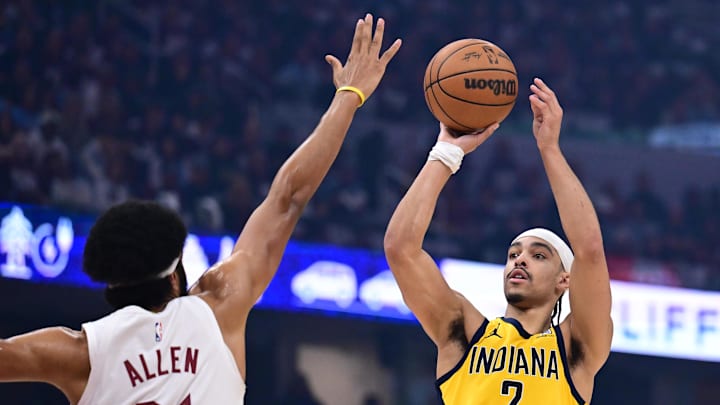 Indiana Pacers guard Andrew Nembhard (2) shoots over the defense of Cleveland Cavaliers center Jarrett Allen (31) during the first half in game one of the second round for the 2025 NBA Playoffs at Rocket Arena.