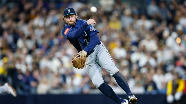 Apr 14, 2026; San Diego, California, USA; Seattle Mariners third baseman Brendan Donovan (33) throws to first base during the seventh inning against the San Diego Padres at Petco Park. Mandatory Credit: David Frerker-Imagn Images