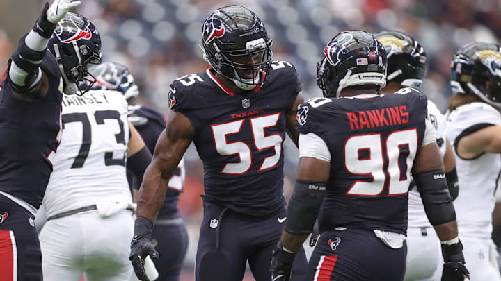 Nov 9, 2025; Houston, Texas, USA; Houston Texans defensive end Danielle Hunter (55) celebrates with defensive tackle Sheldon Rankins (90) during the game against the Jacksonville Jaguars at NRG Stadium. Mandatory Credit: Troy Taormina-Imagn Images