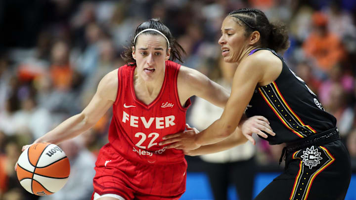 Sep 25, 2024; Uncasville, Connecticut, USA; Indiana Fever guard Caitlin Clark (22) dribbles the ball during the first half against the Connecticut Sun during game two of the first round of the 2024 WNBA Playoffs at Mohegan Sun Arena. Mandatory Credit: Paul Rutherford-Imagn Images Sep 25, 2024; Uncasville, Connecticut, USA; Indiana Fever guard Caitlin Clark (22) dribbles the ball during the first half against the Connecticut Sun during game two of the first round of the 2024 WNBA Playoffs at Mohegan Sun Arena. Mandatory Credit: Paul Rutherford-Imagn Images