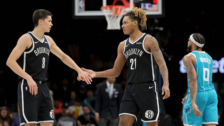 Dec 1, 2025; Brooklyn, New York, USA; Brooklyn Nets guard Egor Demin (8) high fives forward Noah Clowney (21) in front of Charlotte Hornets forward Miles Bridges (0) during the third quarter at Barclays Center. Mandatory Credit: Brad Penner-Imagn Images Dec 1, 2025; Brooklyn, New York, USA; Brooklyn Nets guard Egor Demin (8) high fives forward Noah Clowney (21) in front of Charlotte Hornets forward Miles Bridges (0) during the third quarter at Barclays Center. Mandatory Credit: Brad Penner-Imagn Images