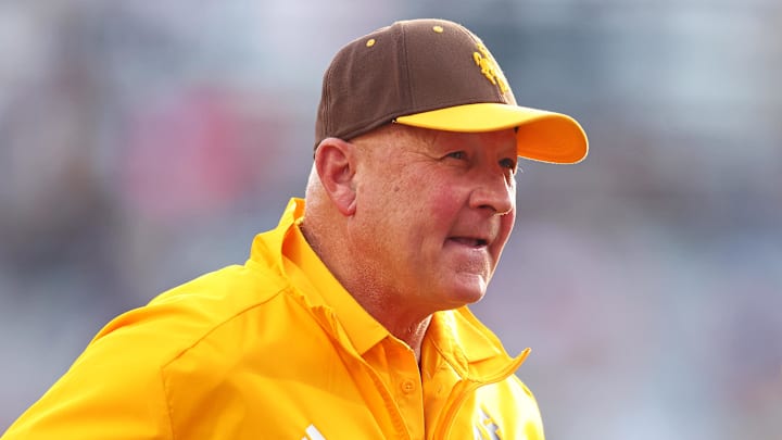 Wyoming Cowboys head coach Craig Bohl looks on