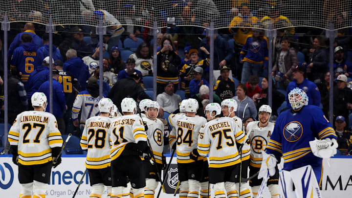 Mar 25, 2026; Buffalo, New York, USA;  The Boston Bruins celebrate a win over the Buffalo Sabres at KeyBank Center. Mandatory Credit: Timothy T. Ludwig-Imagn Images
