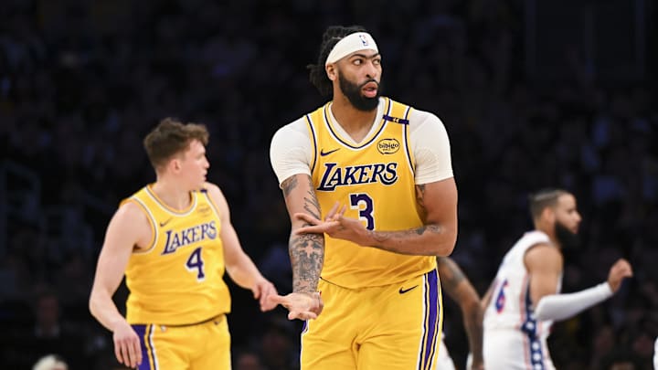 Nov 8, 2024; Los Angeles, California, USA; Los Angeles Lakers forward Anthony Davis (3) reacts after shooting a three point basket against the Philadelphia 76ers during the first half at Crypto.com Arena. Mandatory Credit: Jonathan Hui-Imagn Images