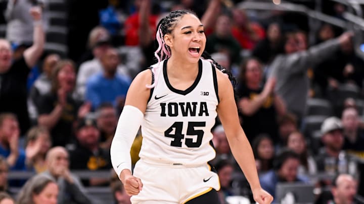 Mar 7, 2026; Indianapolis, IN, USA; Iowa Hawkeyes forward Hannah Stuelke (45) celebrates after a play against the Michigan Wolverines during the second half at Gainbridge Fieldhouse. Mandatory Credit: Robert Goddin-Imagn Images