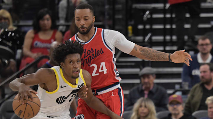 Dec 16, 2024; Inglewood, California, USA;    Los Angeles Clippers guard Norman Powell (24) defends Utah Jazz guard Collin Sexton (2) in the second half at Intuit Dome. Mandatory Credit: Jayne Kamin-Oncea-Imagn Images