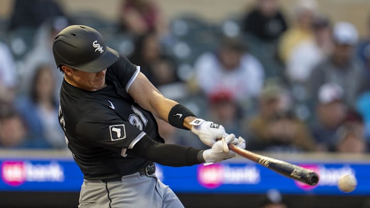 Apr 22, 2025; Minneapolis, Minnesota, USA; Chicago White Sox third baseman Bobby Dalbec (31) hits a double against the Minnesota Twins in the fourth inning at Target Field. Mandatory Credit: Jesse Johnson-Imagn Images