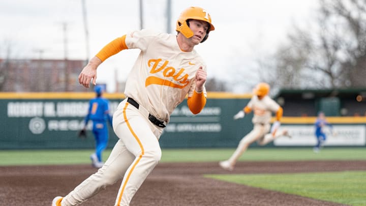 Tennessee's Blake Grimmer (14) rounds the bases during a college baseball game between Tennessee and Hofstra at Lindsey Nelson Stadium in Knoxville on Sunday, Feb. 16, 2025.